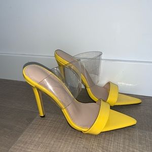 Yellow high heels sandals.